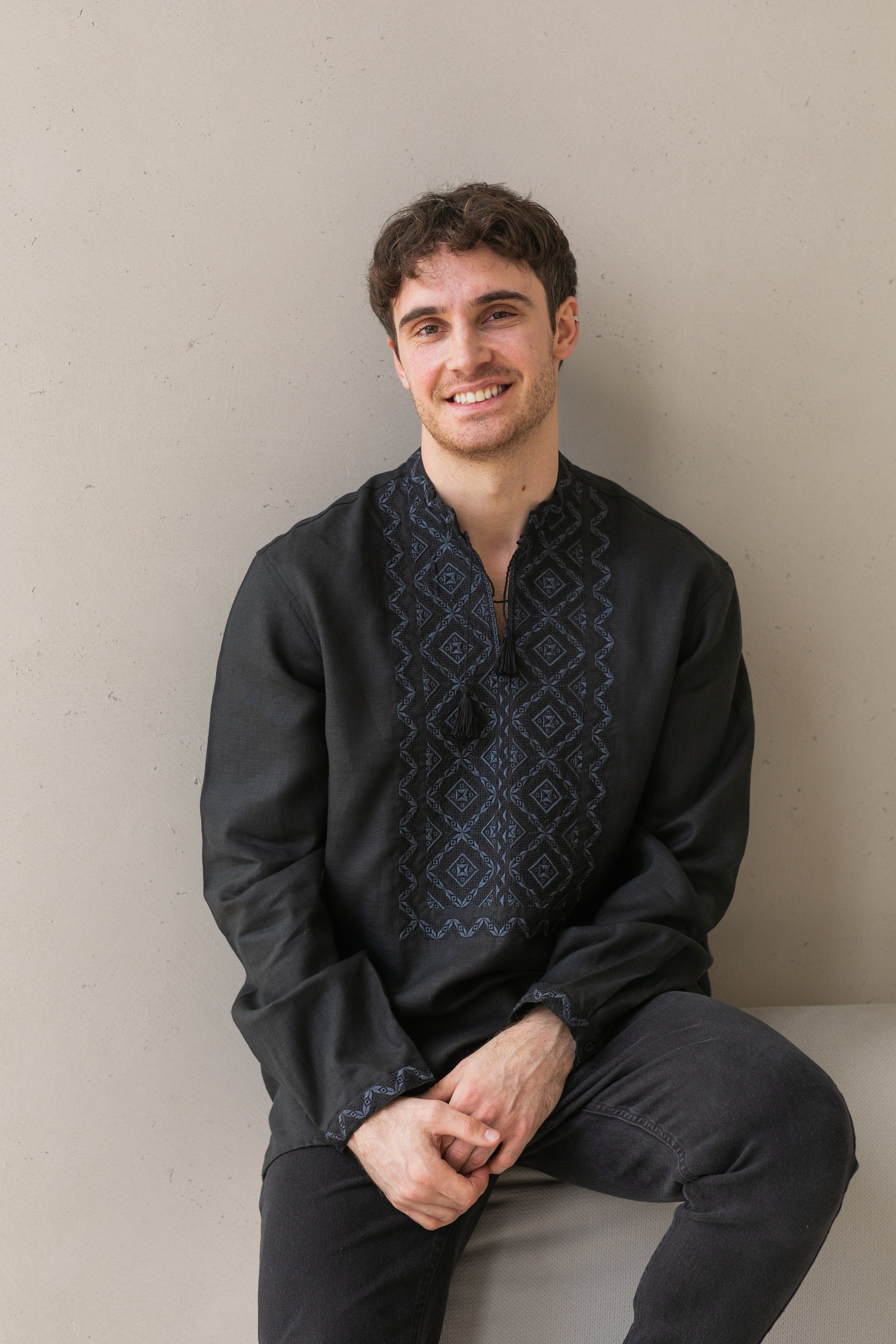 Black linen men's embroidered shirt with Ukrainian Vyshyvanka Poltava ornament.