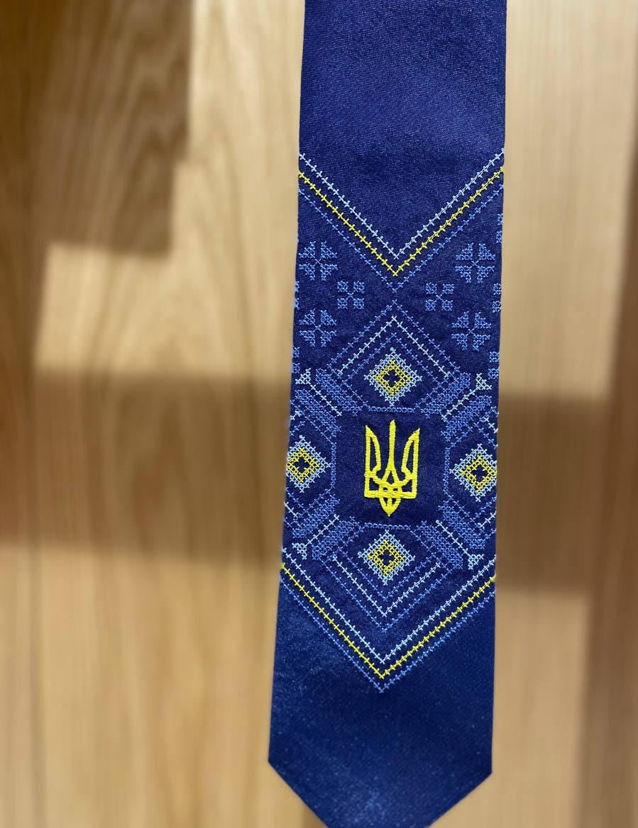 Blue satin tie with Ukrainian Tryzub embroidery, perfect for business or formal events.