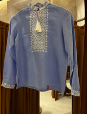 Blue Ukrainian Vyshyvanka shirt for boys with white cross-stitch embroidery, made from 100% natural linen.