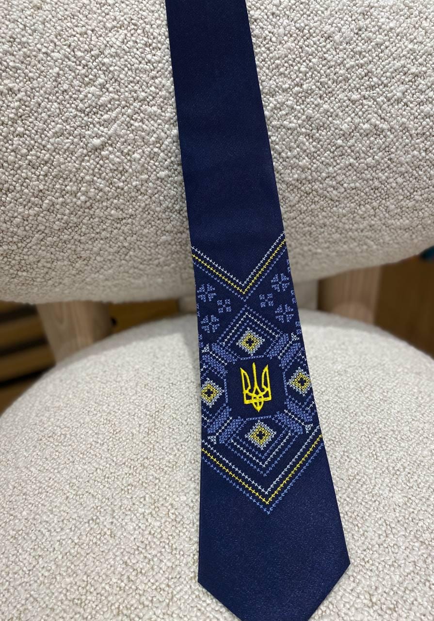 Blue satin tie with embroidered Ukrainian Trident, ideal for business and formal events.