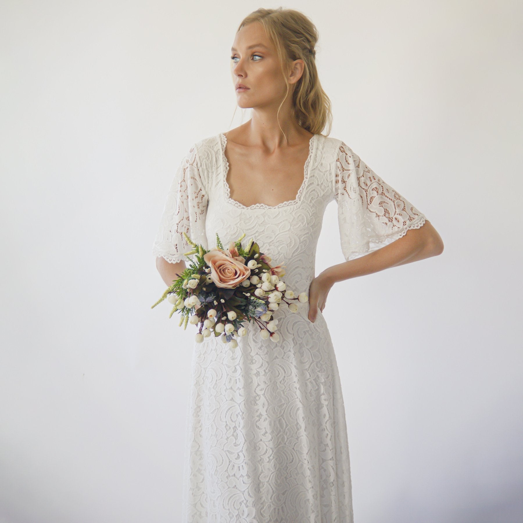Calmera Square Lace Wedding Dress with square neckline and butterfly sleeves, showcasing elegant bohemian bridal style.