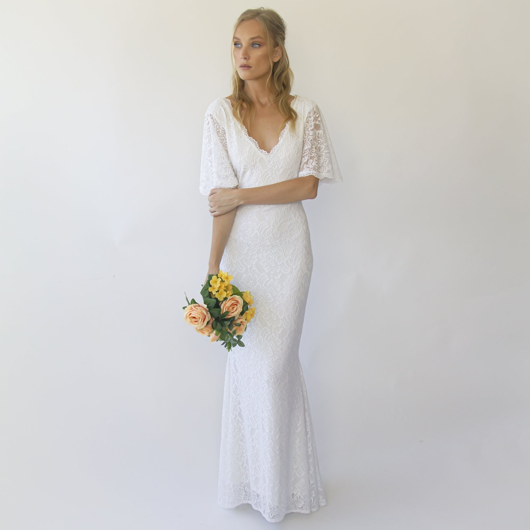 Elvenya Boho Sheath Wedding Dress with butterfly sleeves and V-neckline in ivory lace, perfect for outdoor or beach weddings.