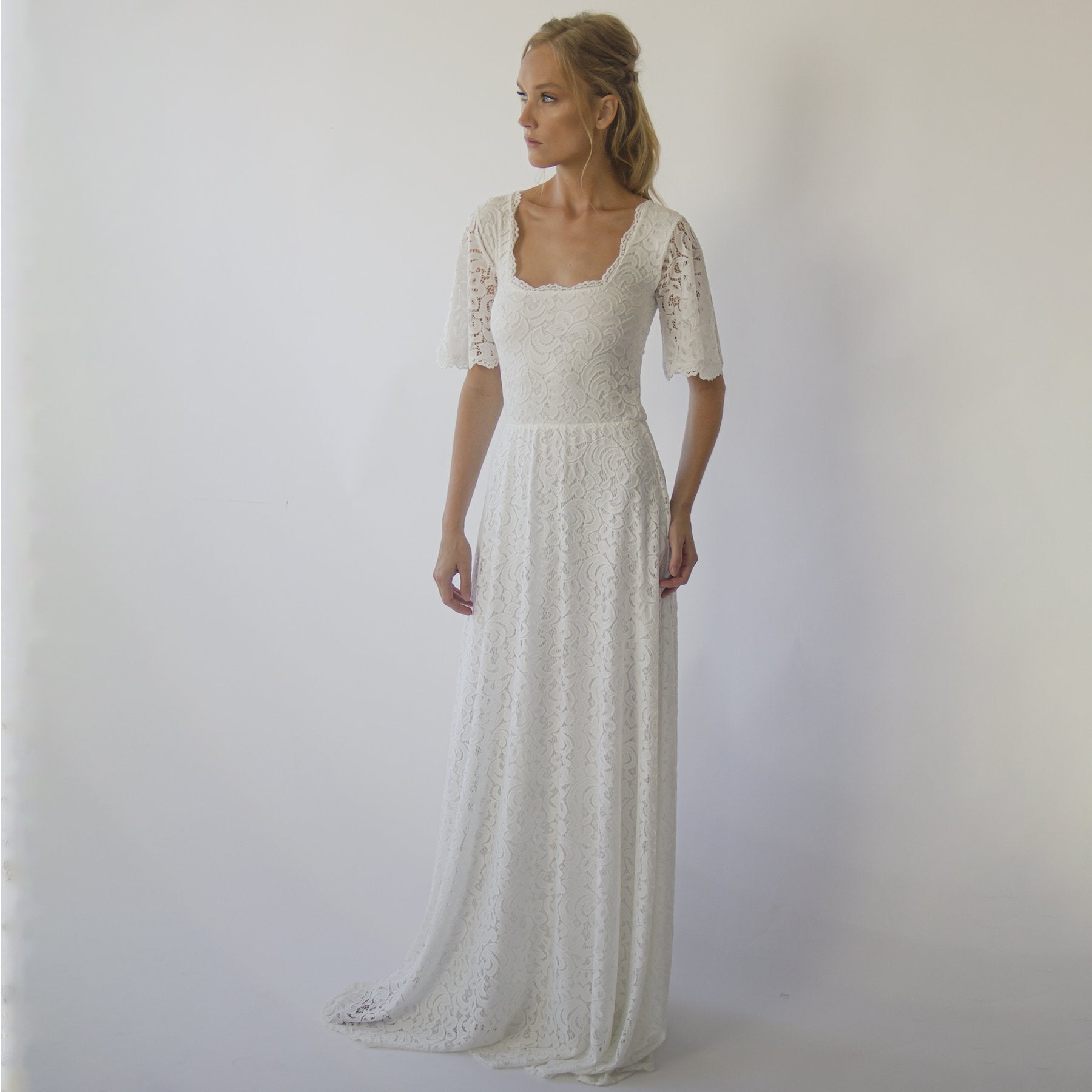 Calmera Square Lace Wedding Dress with square neckline and butterfly sleeves, offers a bohemian, ethereal look for elegant brides.