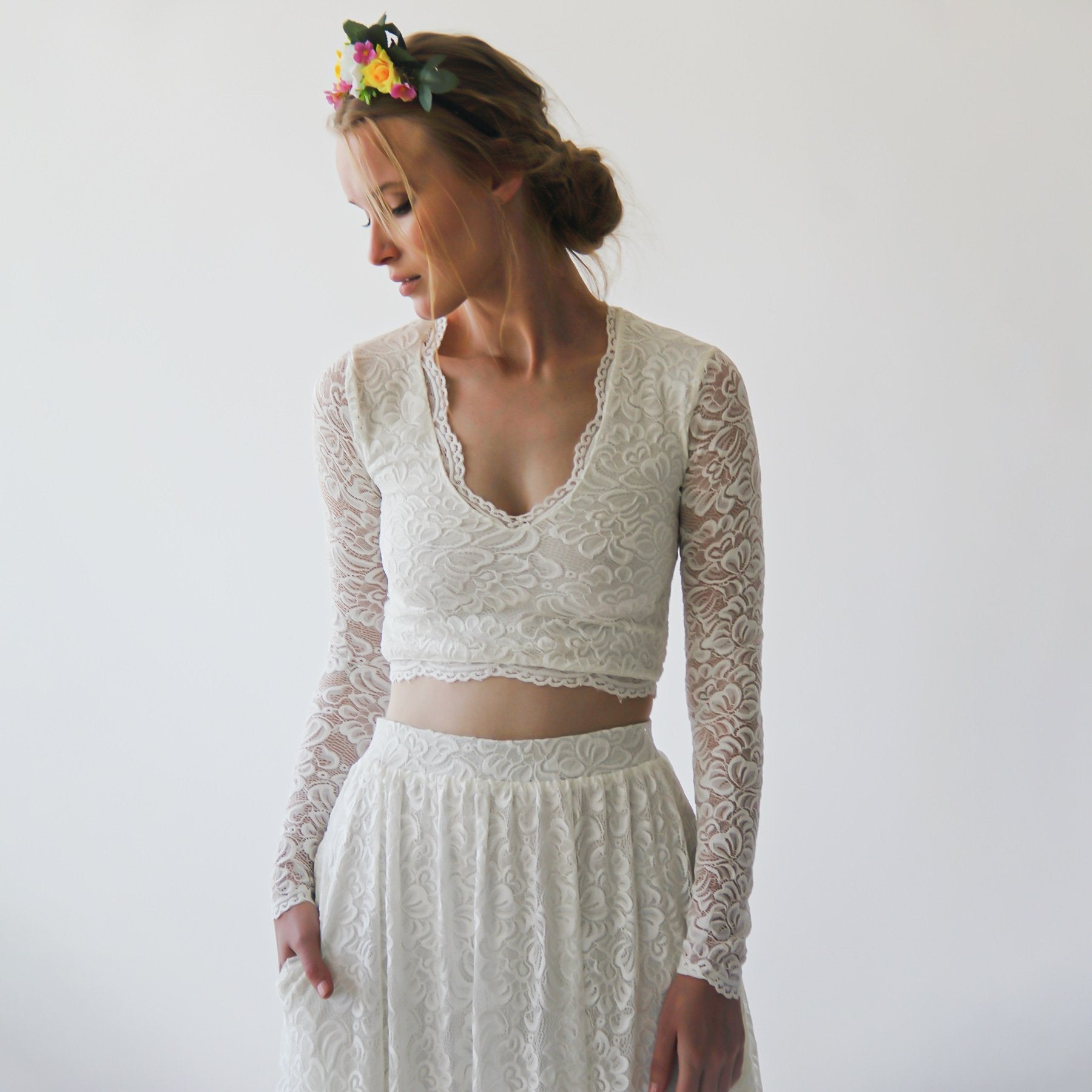 Elarin long sleeve bridal lace top with V neckline, paired with a matching lace skirt, perfect for weddings or romantic occasions.