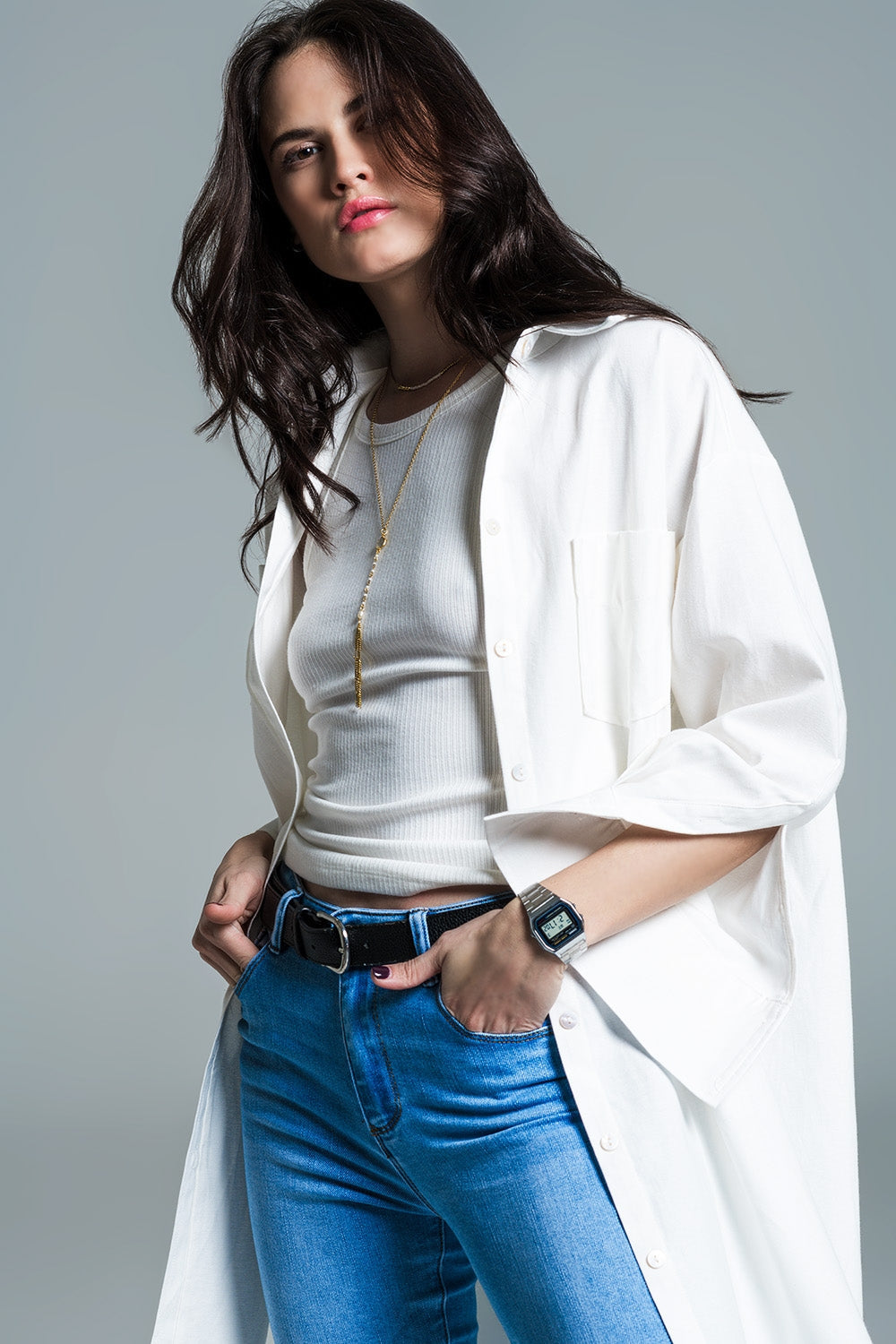 Woman wearing Naeryn Boyfriend 3/4 Sleeve Shirt in white, styled with casual outfit including blue jeans, showcasing relaxed fit and style.