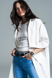 Woman wearing Naeryn Boyfriend 3/4 Sleeve Shirt in white, styled with casual outfit including blue jeans, showcasing relaxed fit and style.