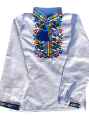 Boys' linen shirt with traditional Ukrainian vyshyvanka embroidery in vibrant floral patterns, perfect for cultural events.