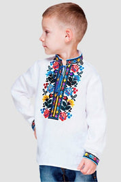 Boys' embroidered linen shirt with traditional Ukrainian vyshyvanka floral patterns, perfect for cultural events and family gatherings.