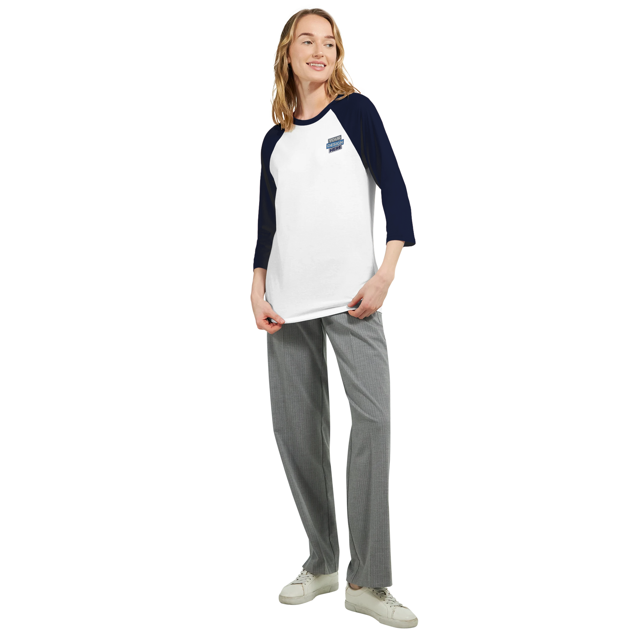 Woman wearing Mervelle Raglan Sleeve Tee in white with contrasting navy sleeves and gray pants for casual style.