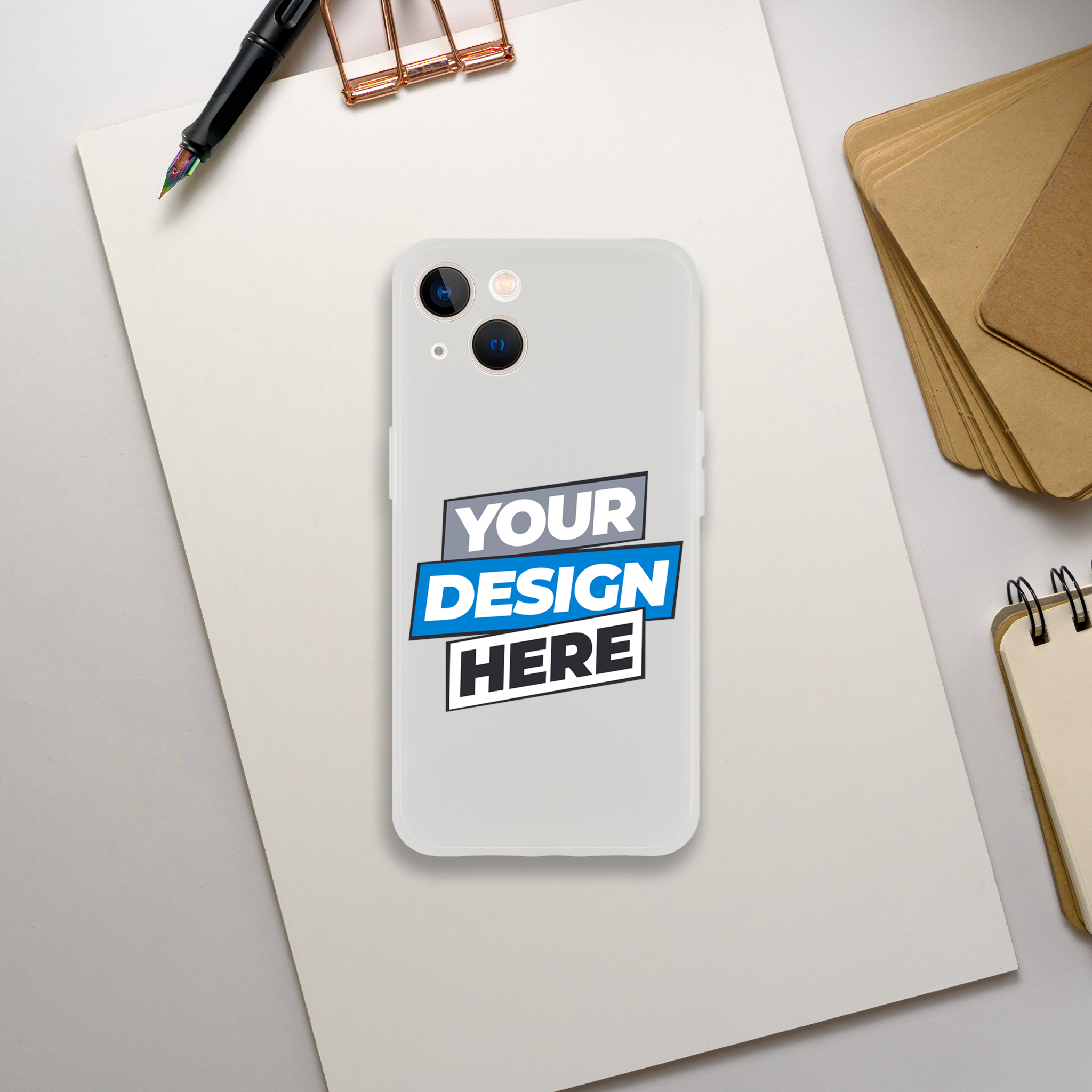 Flexi Case on a desk, customizable transparent phone case showcasing art design options, impact-resistant and wireless charging compatible.