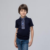 Boy wearing Children's Embroidered T-Shirt 'Cossack Blue' with traditional Ukrainian 'Kozatska' pattern, dark blue with blue embroidery.