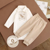 Cream baby boy onesie with Ukrainian embroidery, long sleeve Vyshyvanka style, ideal for special occasions, cotton bodysuit with pants.