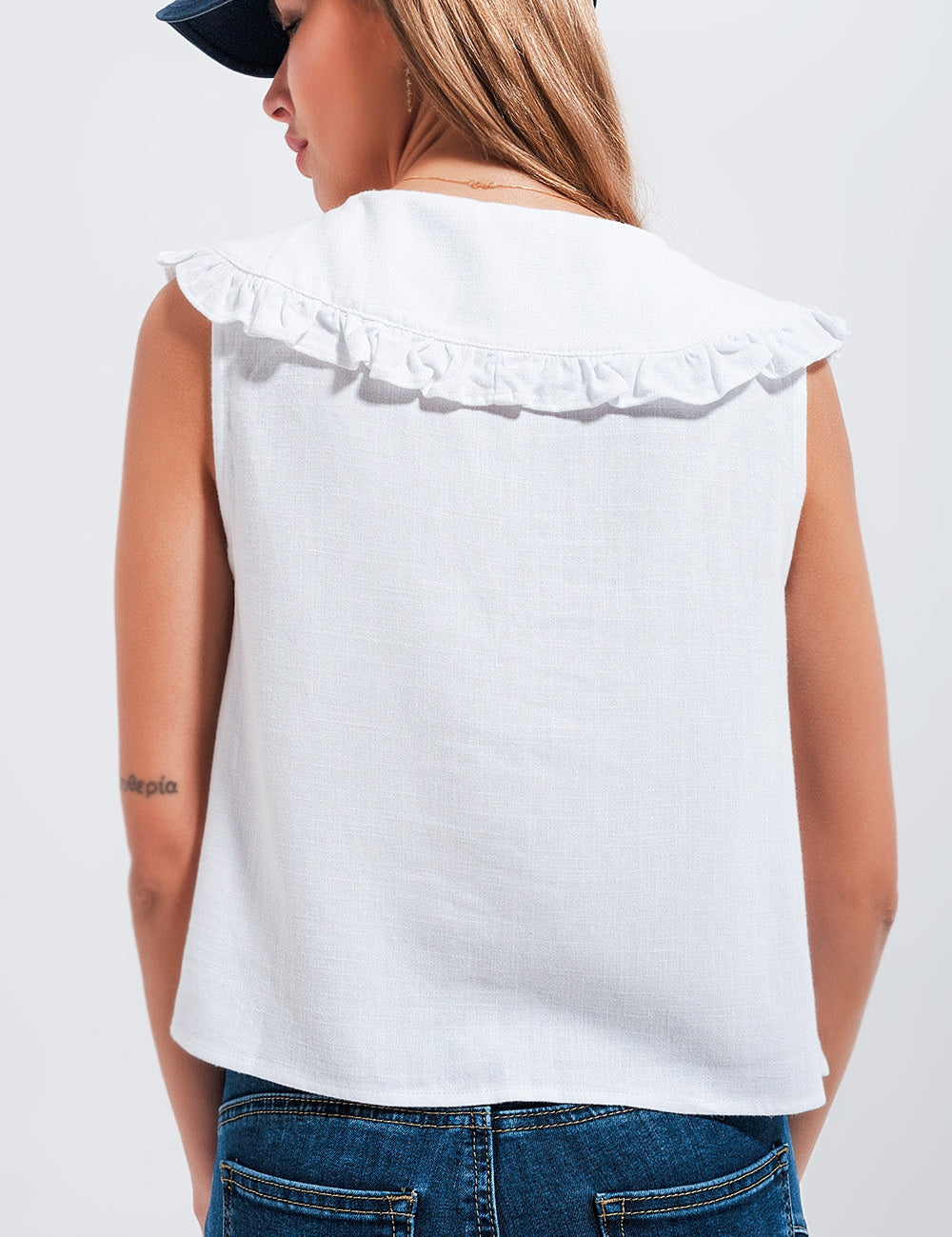 Back view of the Lunelle Bib-Collar Crop in white, featuring a prairie collar with ruffle trim, perfect for vintage-inspired outfits.