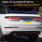 Custom Ukrainian license plate on car, made of durable aluminum, displaying the flag of Ukraine for patriotic decor.