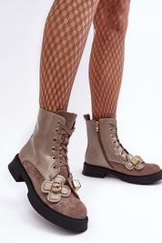 Florynne Floral-Laced Winter Boots with blossoms, eco leather, side zipper, platform heel, and warm lining, worn with patterned tights.