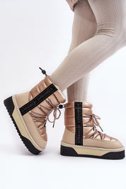 Woman wearing Glacira vegan fur-lined snow boots with non-slip sole and synthetic fur lining, perfect for winter weather and urban chic style.