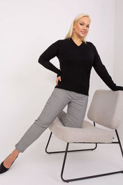 Model wearing Plus Size Mirella Textured Knit Sweater, showcasing cozy elegance with long sleeves and textured detail for versatile style.
