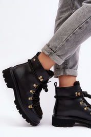 Larkwood Leather Winter Trapper Boots with lace-up design and reinforced heel, shown on model with folded jeans.