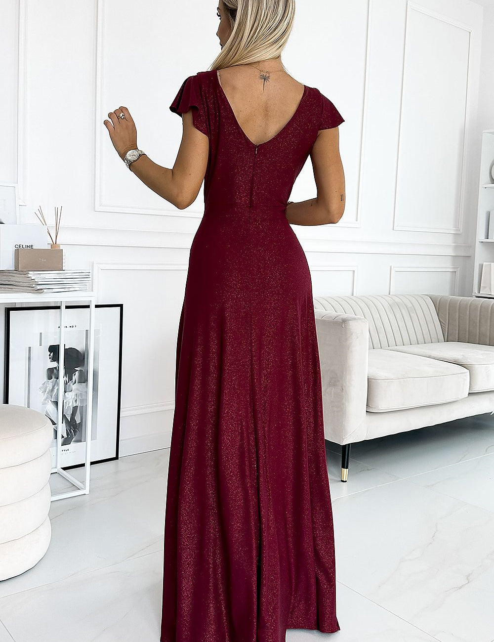 Back view of Meravine Maroon Glitter Wrap Gown with elegant silhouette and flowing full-length skirt, perfect for evening events.