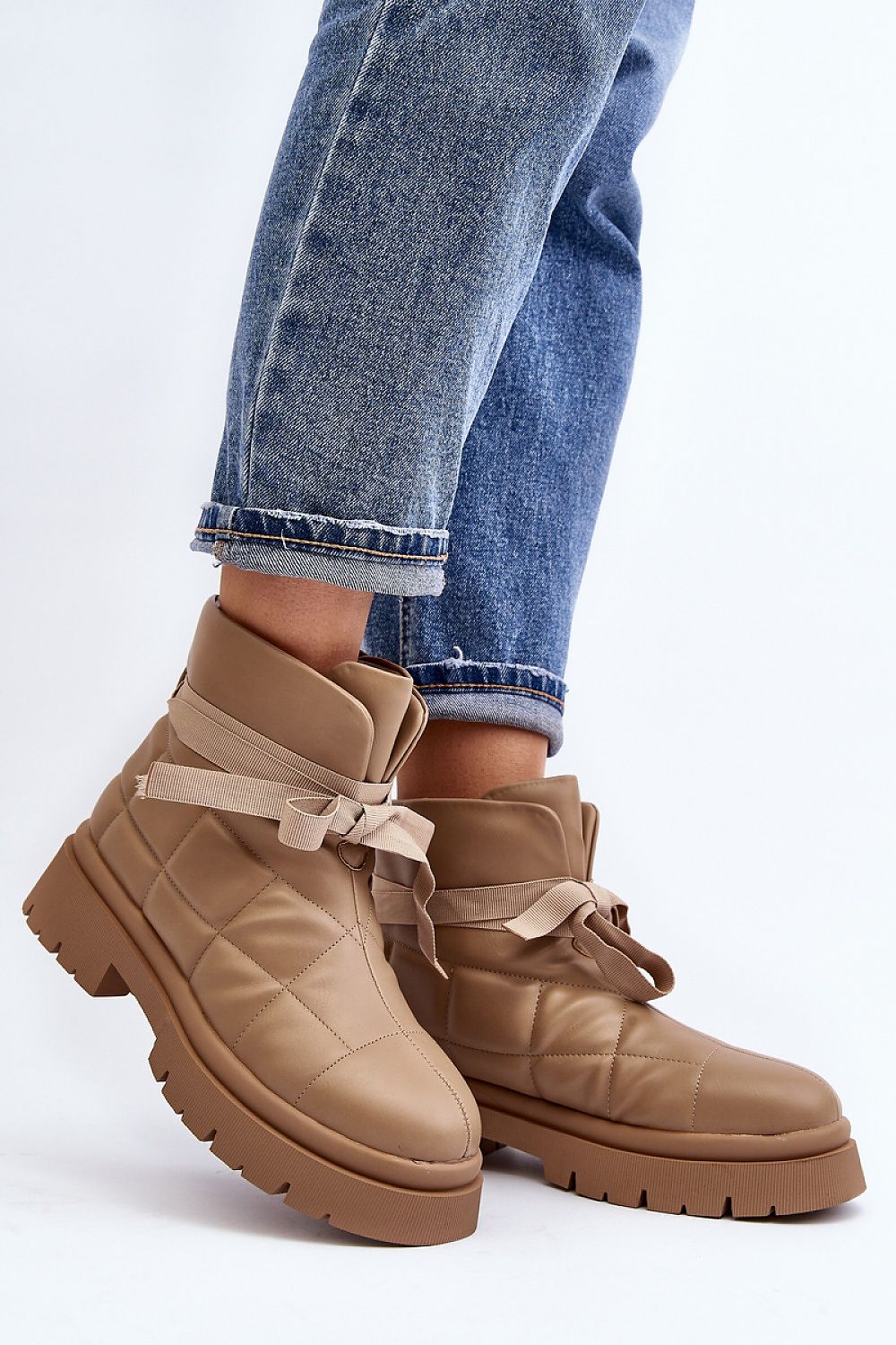 Velda Quilted Slip-On Winter Boots with eco leather and fur-like lining, flat heel and platform, providing comfort and warmth for winter.