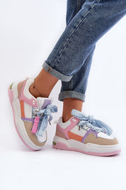 Person wearing colorful lace-up platform sneakers with rolled-up jeans, showcasing modern urban style and eco-friendly materials.