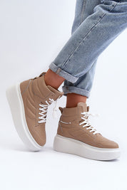 Person wearing Valonne Leather Platform Trainers with 7 cm heel, showcasing natural leather upper and thick platform base.
