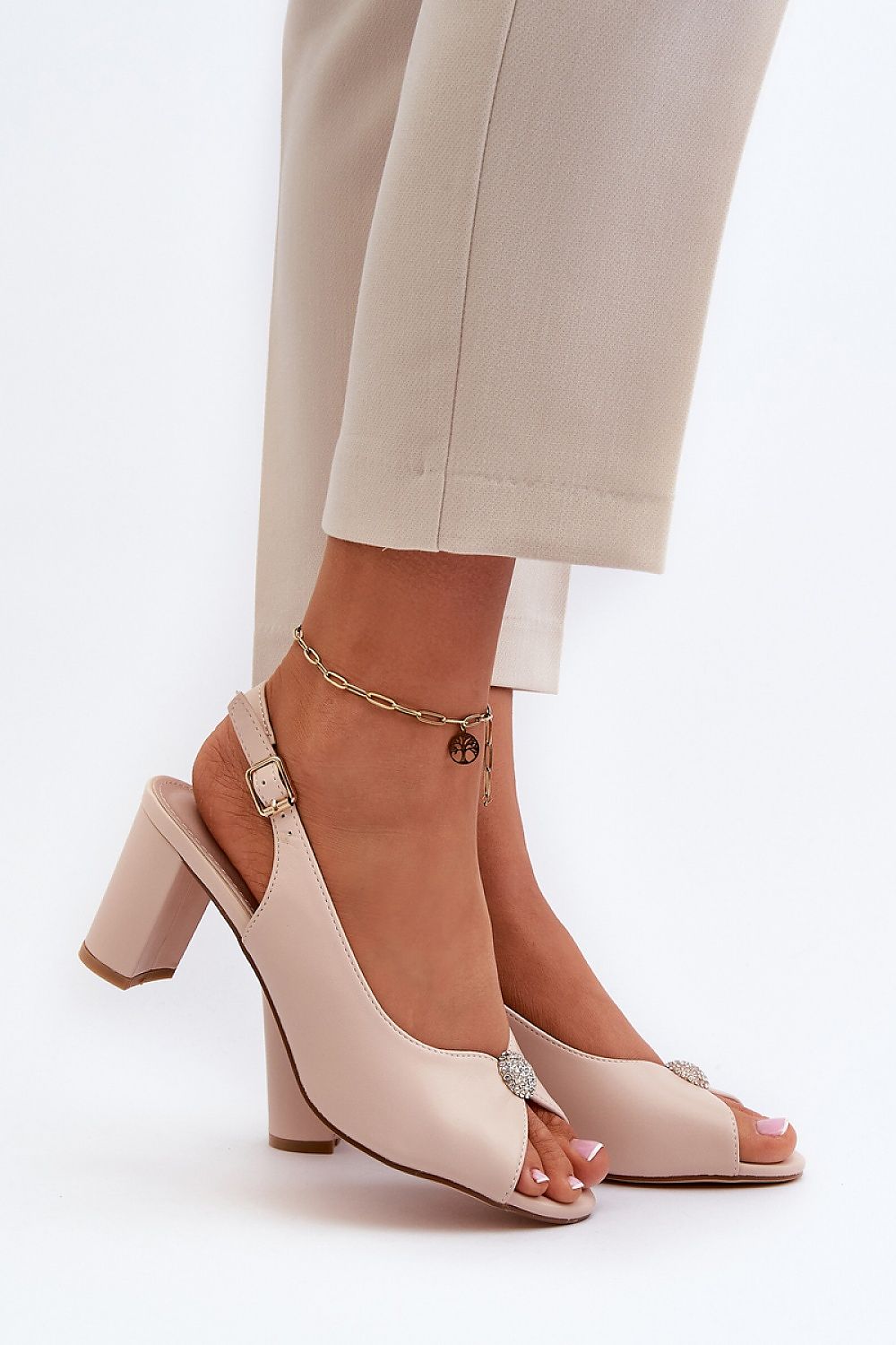 Nivaria Ornamented Heel Strap Sandals in eco leather, featuring a decorative accent, adjustable strap, and structured heel for elegance.
