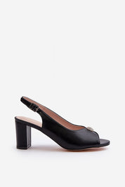 Black Nivaria Ornamented Heel Strap Sandals with eco-leather and decorative accent, featuring adjustable buckle and structured heel.