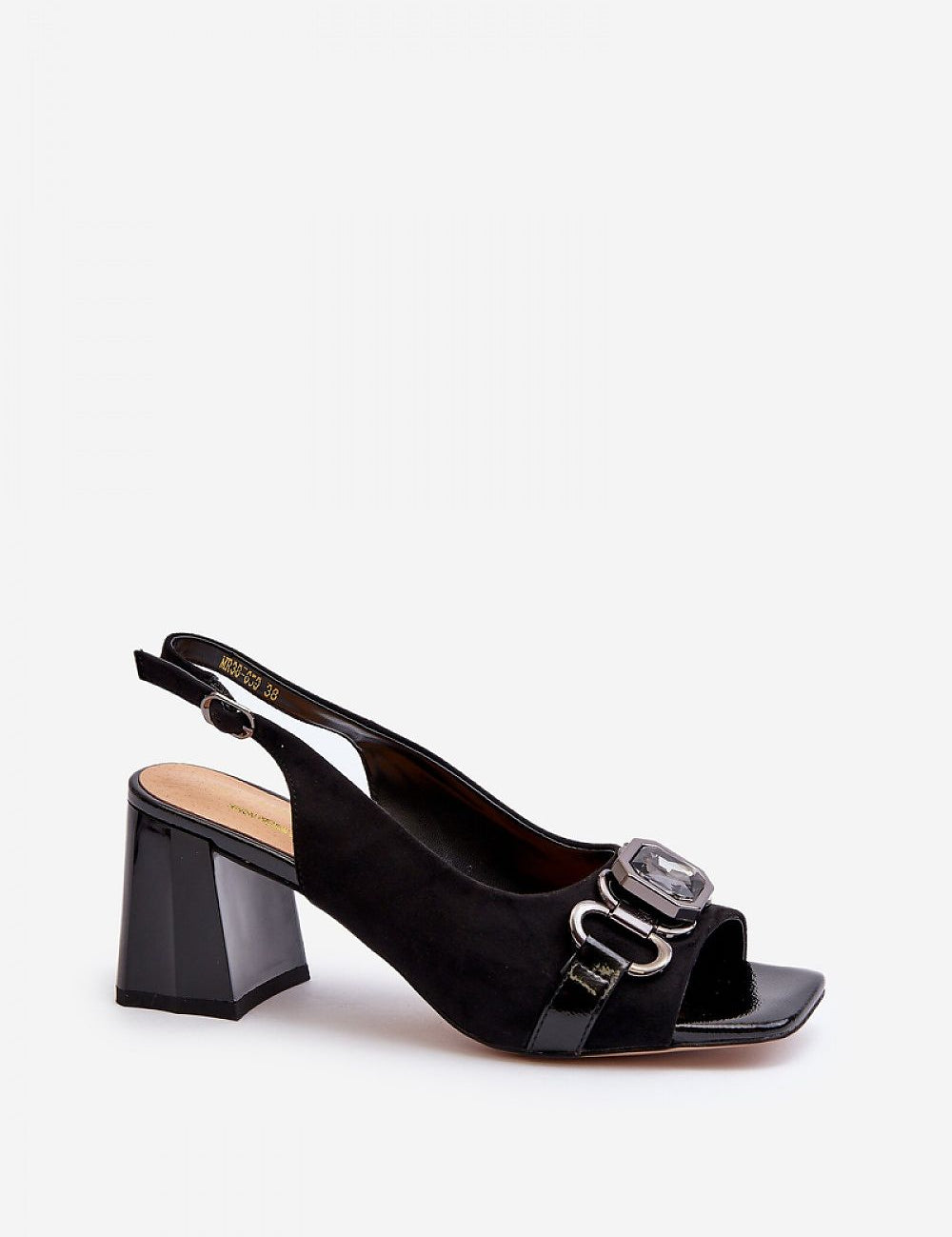 Mirellise black suede heel sandals with decorative detail and adjustable ankle strap, featuring a stable post heel.
