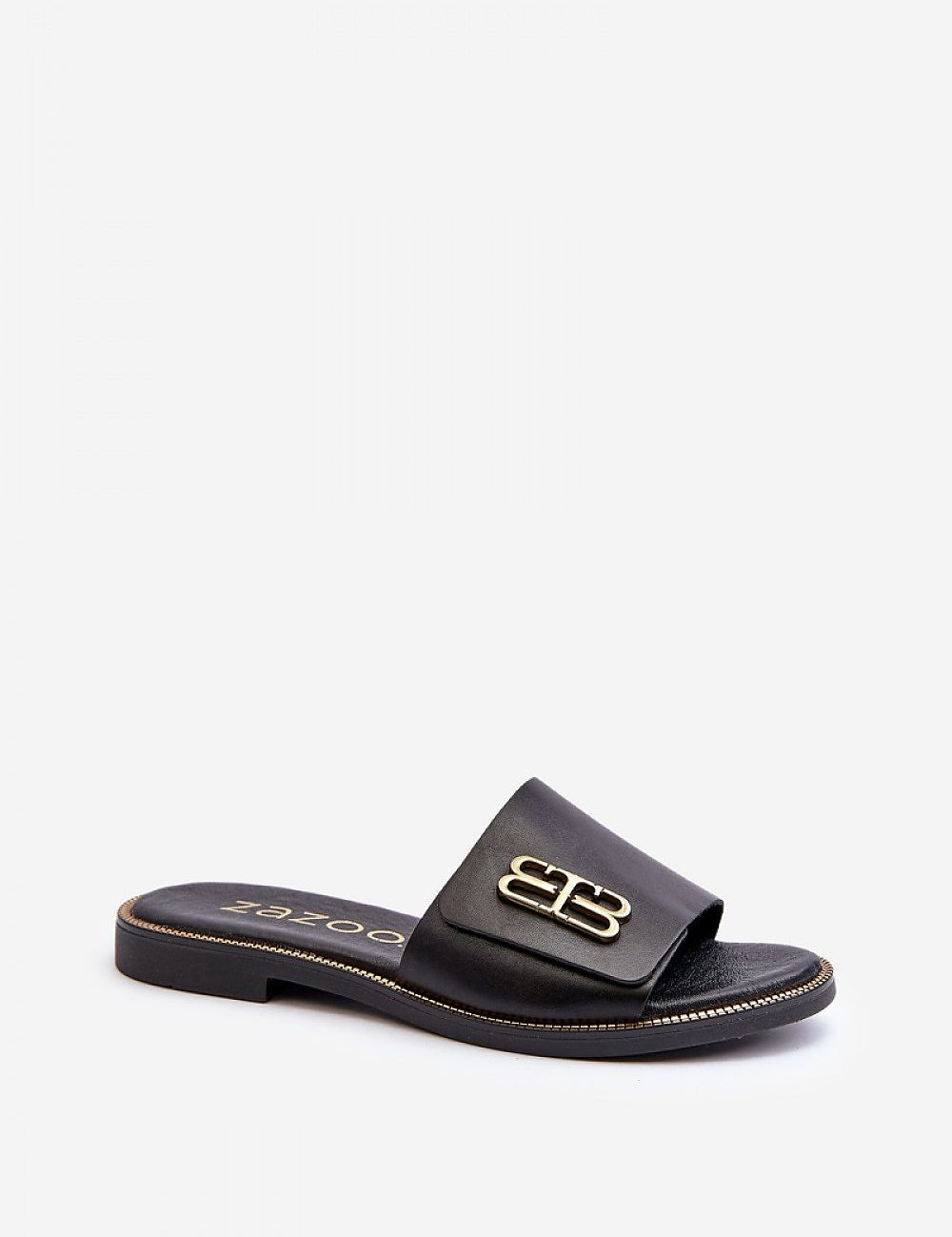 Tavirelle gold trim leather slide, featuring a sleek black design with a low-profile heel and elegant gold accent.