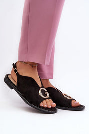Veralya suede sandals with gold accent and adjustable ankle strap, featuring imitation leather upper and low-profile heel.