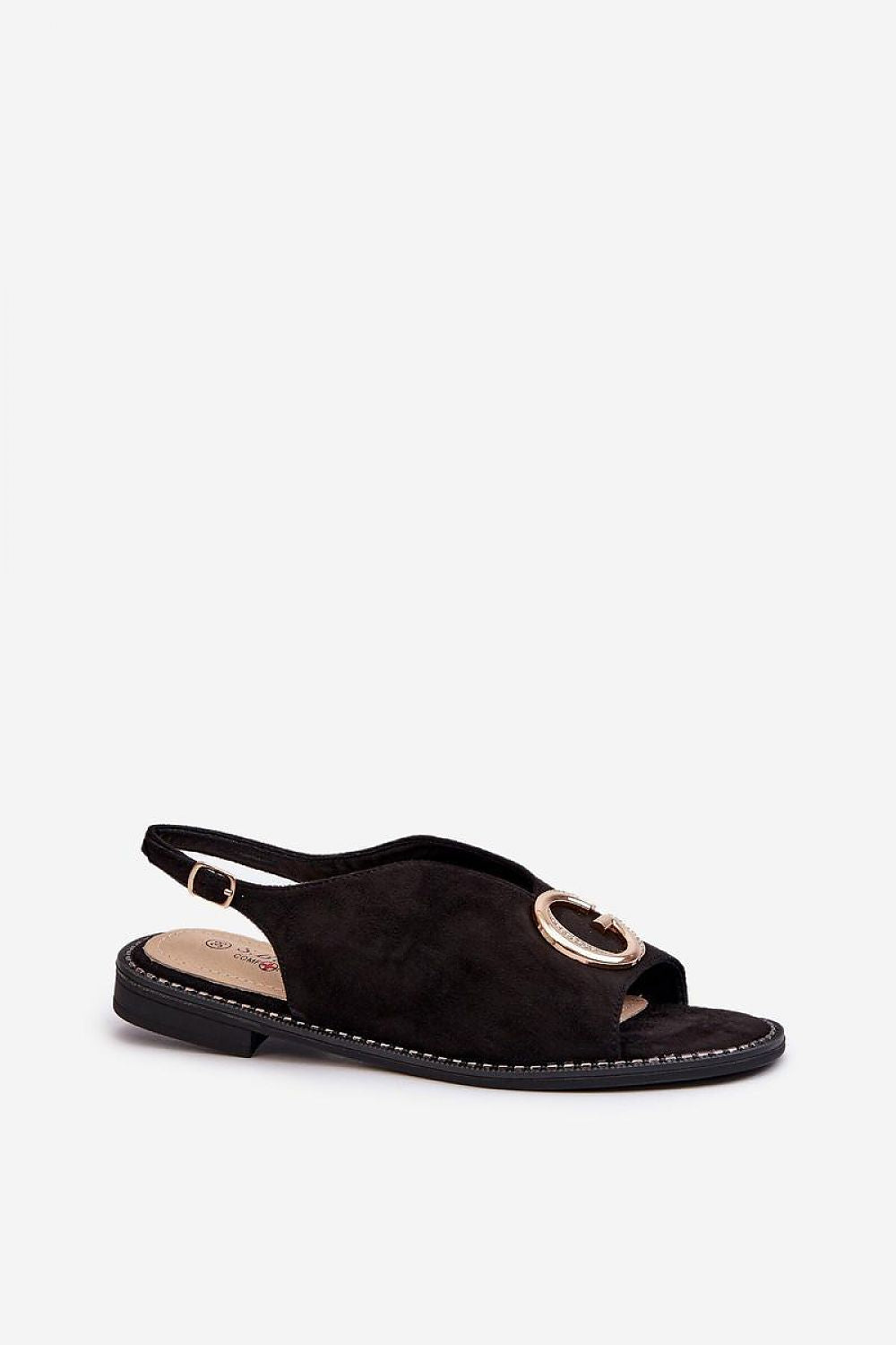 Veralya black suede sandals with gold accent and adjustable ankle strap, featuring a low-profile heel and imitation leather upper.