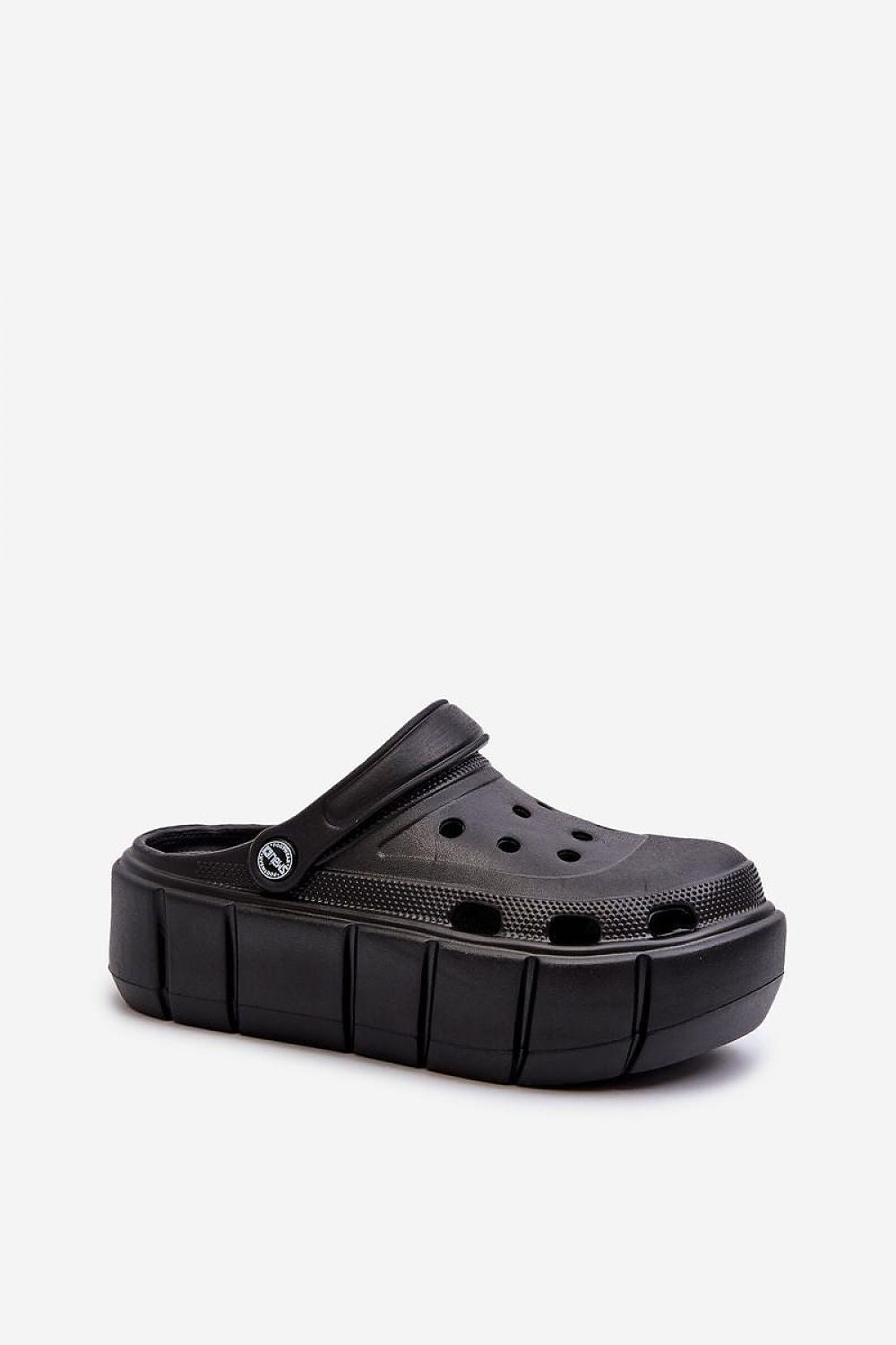 Black Rivaya Sculpted Foam Slides with bold lines and thick foam sole; lightweight, stable platform slides for all-day comfort.