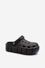 Black Rivaya Sculpted Foam Slides with bold lines and thick foam sole; lightweight, stable platform slides for all-day comfort.