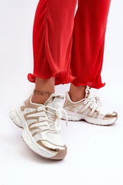 Astaria thick-soled street sneakers with durable artificial leather upper and removable insole, styled with red pants for a bold urban look.