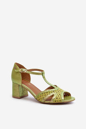 Green genuine leather block heel sandals with adjustable ankle strap, closed heel, and open toe design for elegant formal wear.