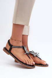 Elavie Blossom Accent Flats with floral decor, soft synthetic finish, and open design for summer elegance on feet.