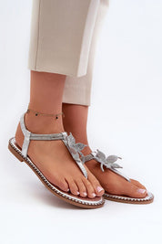 Woman wearing Elavie Blossom Accent Flats with floral design, soft synthetic finish, perfect for summer elegance and comfort.