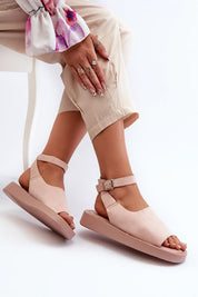 Model wearing Nirella Suede Platform Sandals with eco-suede upper and adjustable ankle strap for added style and comfort.