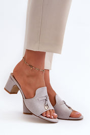Solvera heeled suede flip-flops with 5.5 cm heel, showcasing minimalist elegance suitable for casual or dressier outings.
