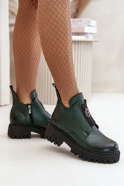 Virelsa Cresthold Leather Form ankle boots with chunky heel, grooved platform, and sculptural embellishment for stylish elevation.