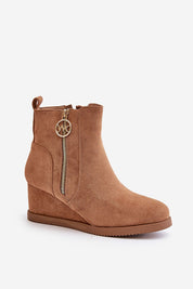 Vermira Insulated Wedge Booties in eco suede with side zipper, rounded toes, and fleece lining for warmth and comfort.