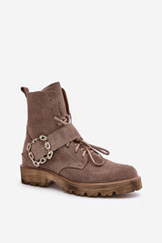 Bravura suede ankle boots with buckle, flat sole, and side zipper for comfort and style.