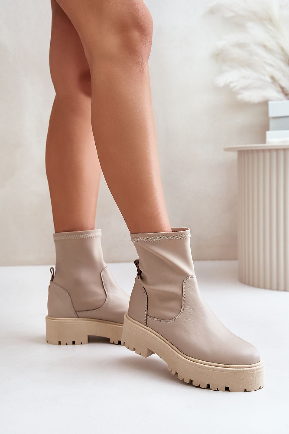 Venire Leather Platform Pull-On Boots featuring ankle-high genuine leather with a stable flat heel and easy slip-on design.