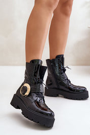 Bravora black leather boots with buckle and platform, featuring side zipper and lace-up front for secure fit on white background.