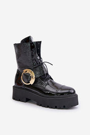 Bravora Leather Buckled Platform Boots with gold buckle, black patent finish, side zipper, lace-up front, and stable platform heel.