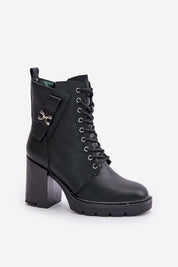 Noctera Luxe Zip-Up Heeled Boots in eco leather with block heel, gold-accented strap, and side zip for winter comfort and urban style.