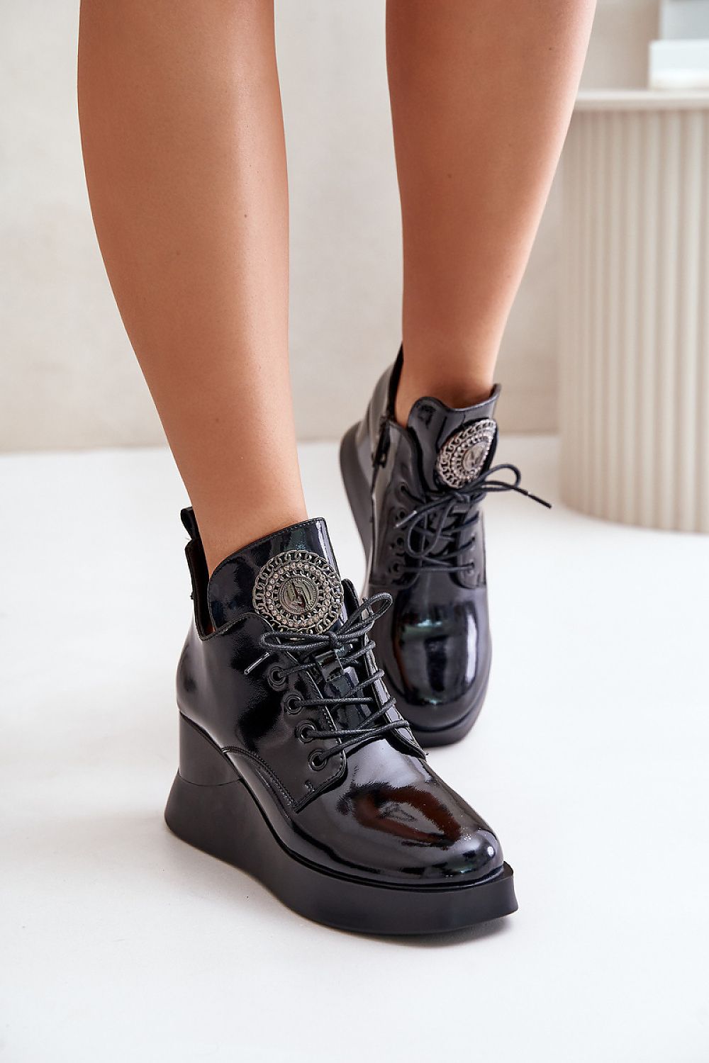 Tavendra natural leather platform boots with block heel, side zipper, and front lacing, featuring stylish tongue embellishment for urban wear.