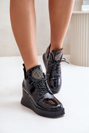 Tavendra natural leather platform boots with block heel, side zipper, and front lacing, featuring stylish tongue embellishment for urban wear.