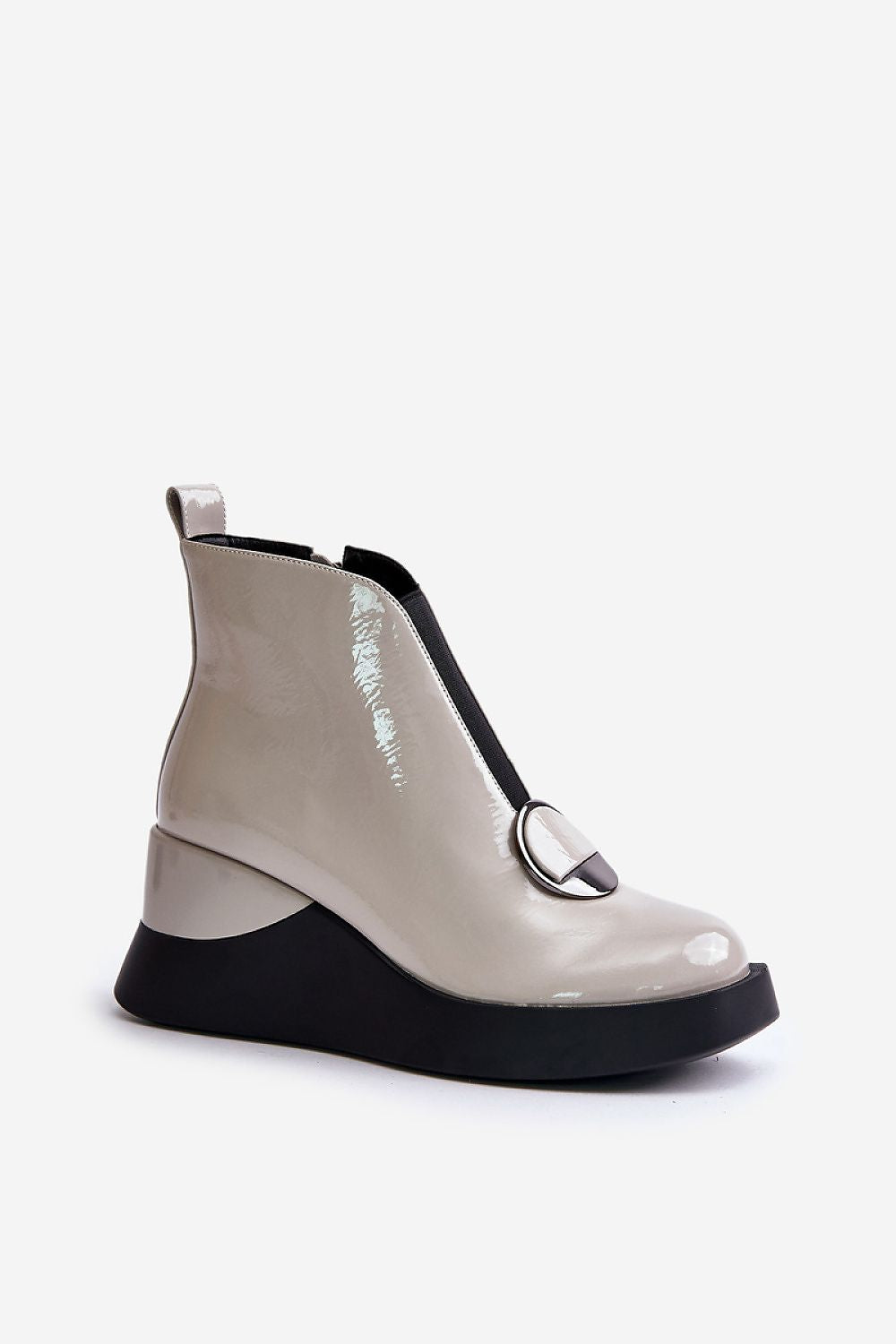 Bravina Platform Ankle Boots in eco leather with side zipper, front elastic, & ornamental detail; perfect for cold weather style and comfort.